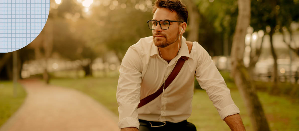 Man riding bike while listening to music