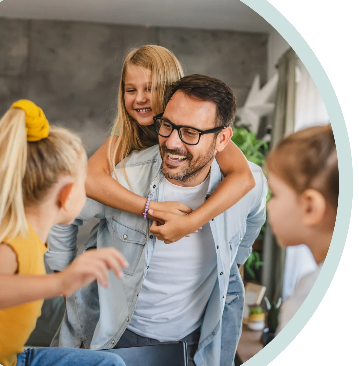 Three friends smiling, looking at a phone and enjoying beverages, with happy, confident smiles, with Spirit Dental coverage.